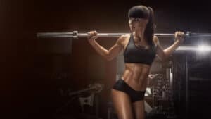 sporty sexy woman doing squat workout gym 147765 118